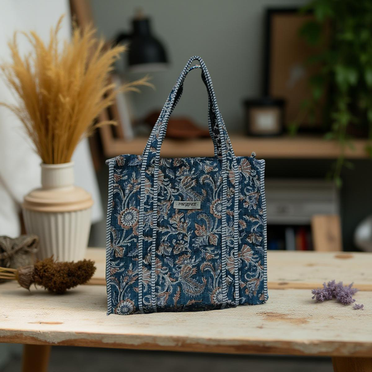 Floral blue mini tote bag with zip.