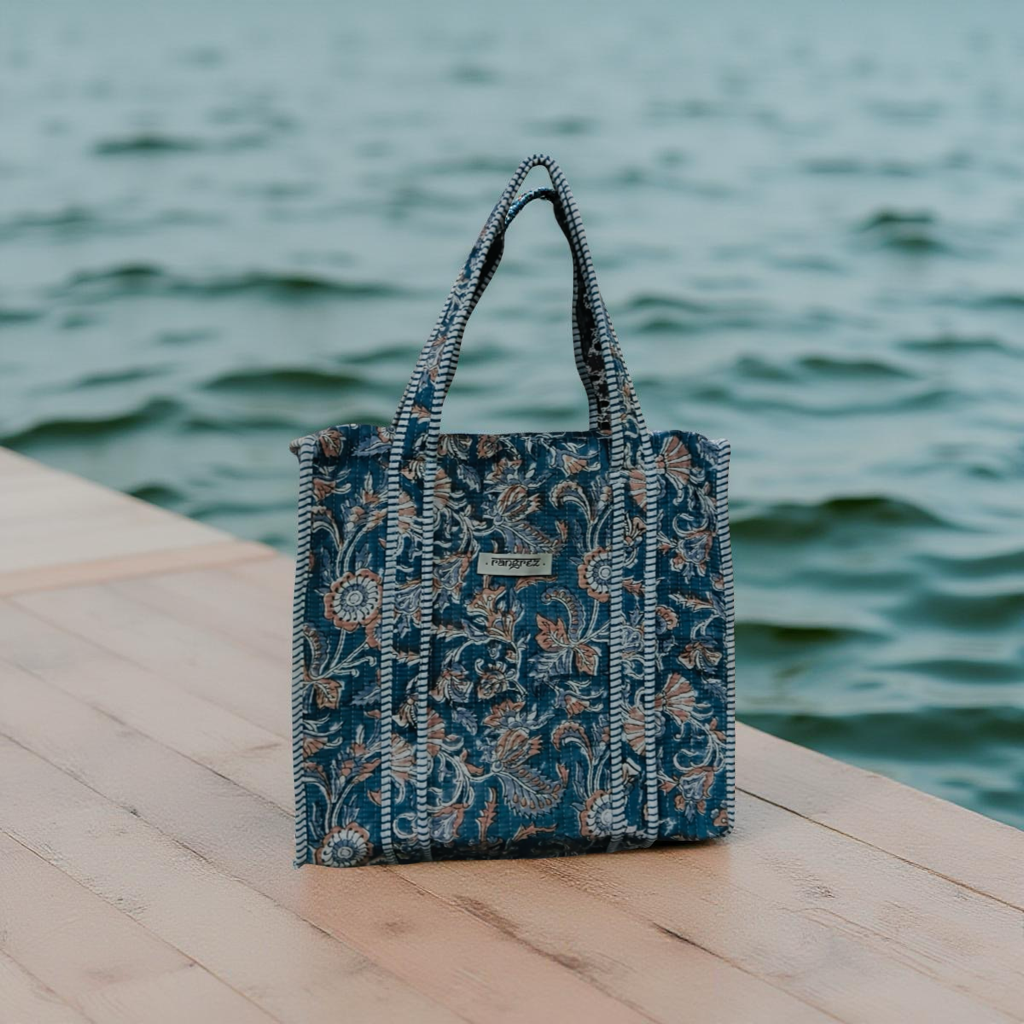 Floral blue mini tote bag with zip.