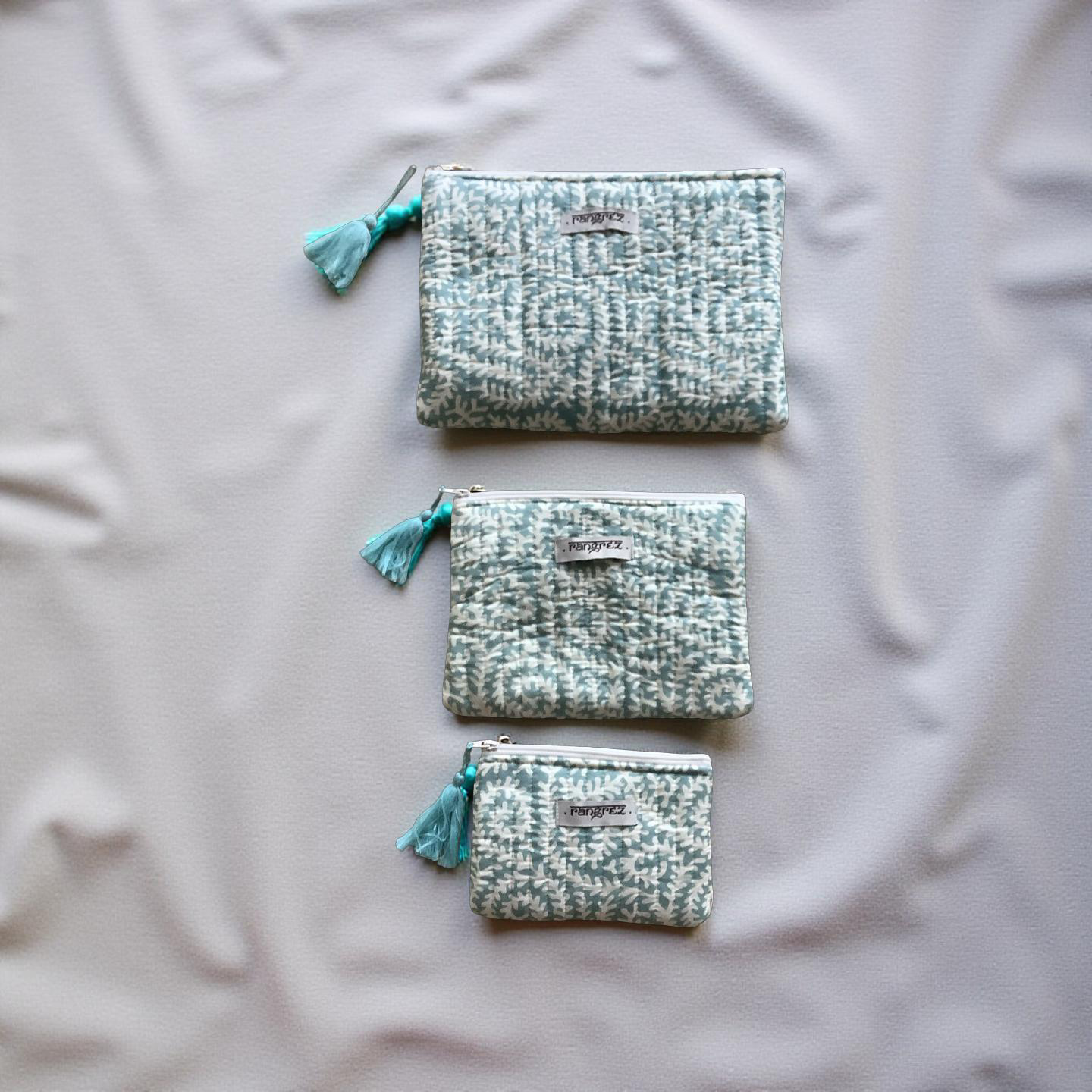 Spiral green three piece pouch set