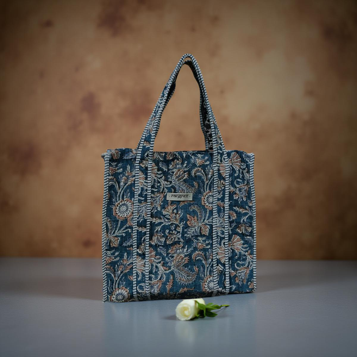 Floral blue mini tote bag with zip.