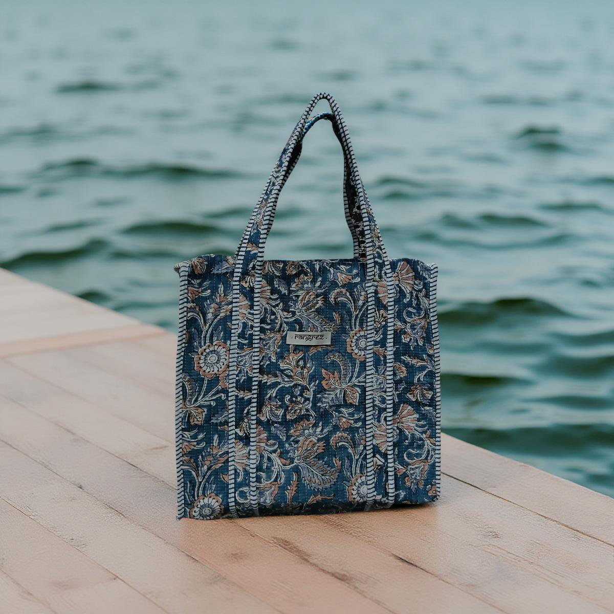 Floral blue mini tote bag with zip.